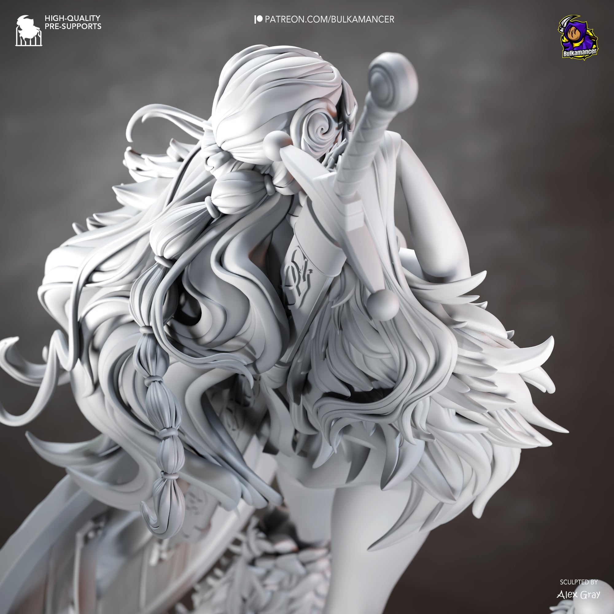The image is a detailed, intricate statue of a female character with flowing, elaborate hair and a sword. The statue appears to be a highly skilled warrior or warrior princess, with a strong and determined expression. The image is a close-up view of the statue, showcasing the intricate details and craftsmanship of the artwork.