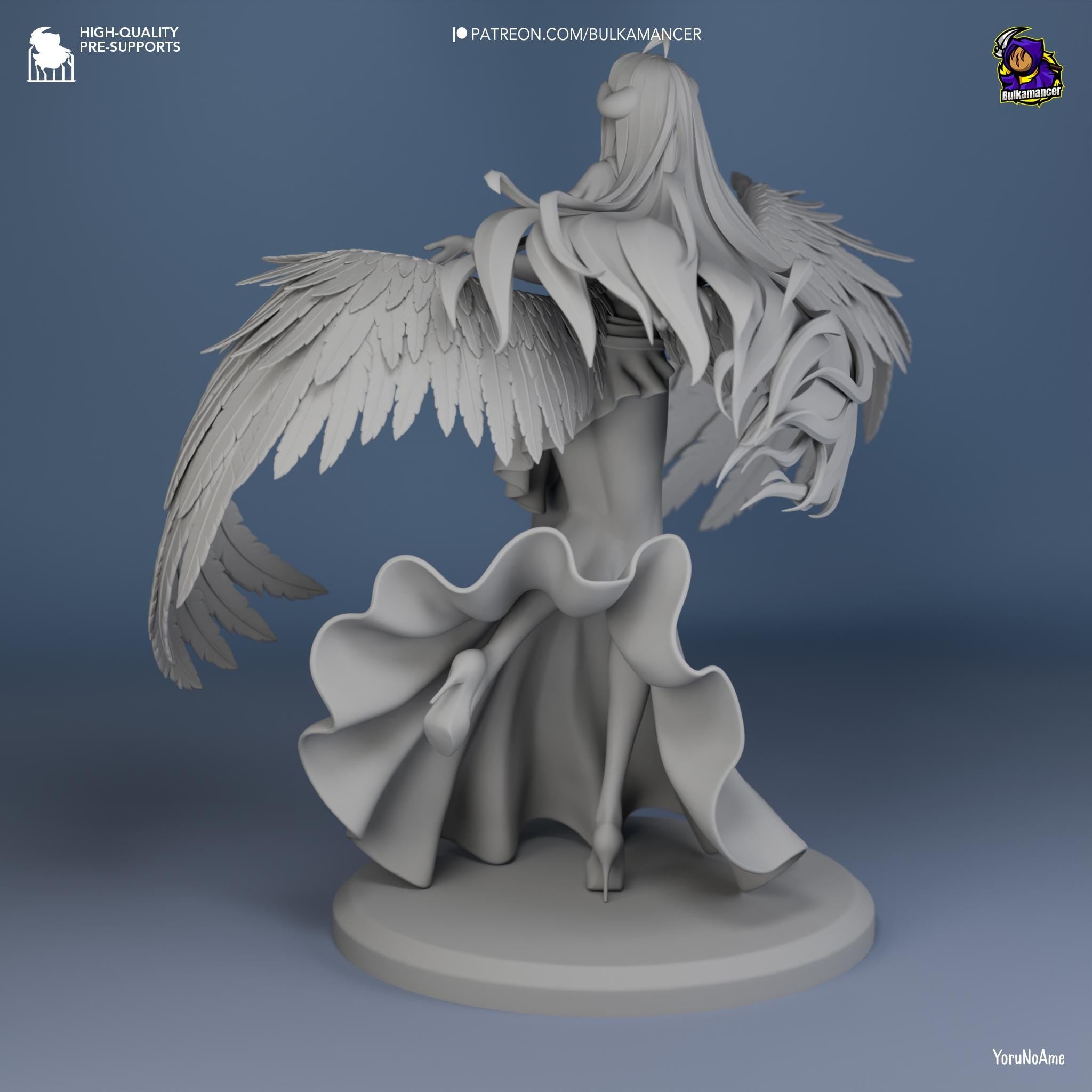 a statue of a woman with white wings