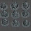 a collection of various 3D models or designs, including shields, helmets, and other metallic or metallic-looking objects. The objects appear to be in a digital format, possibly as a 3D rendering or a 3D model. The image does not contain any text or specific details about the objects, and it does not include any descriptions or explanations about the objects.