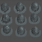 a collection of various 3D models or designs, including shields, helmets, and other metallic or metallic-looking objects. The objects appear to be in a digital format, possibly as a 3D rendering or a 3D model. The image does not contain any text or specific details about the objects, and it does not include any descriptions or explanations about the objects.