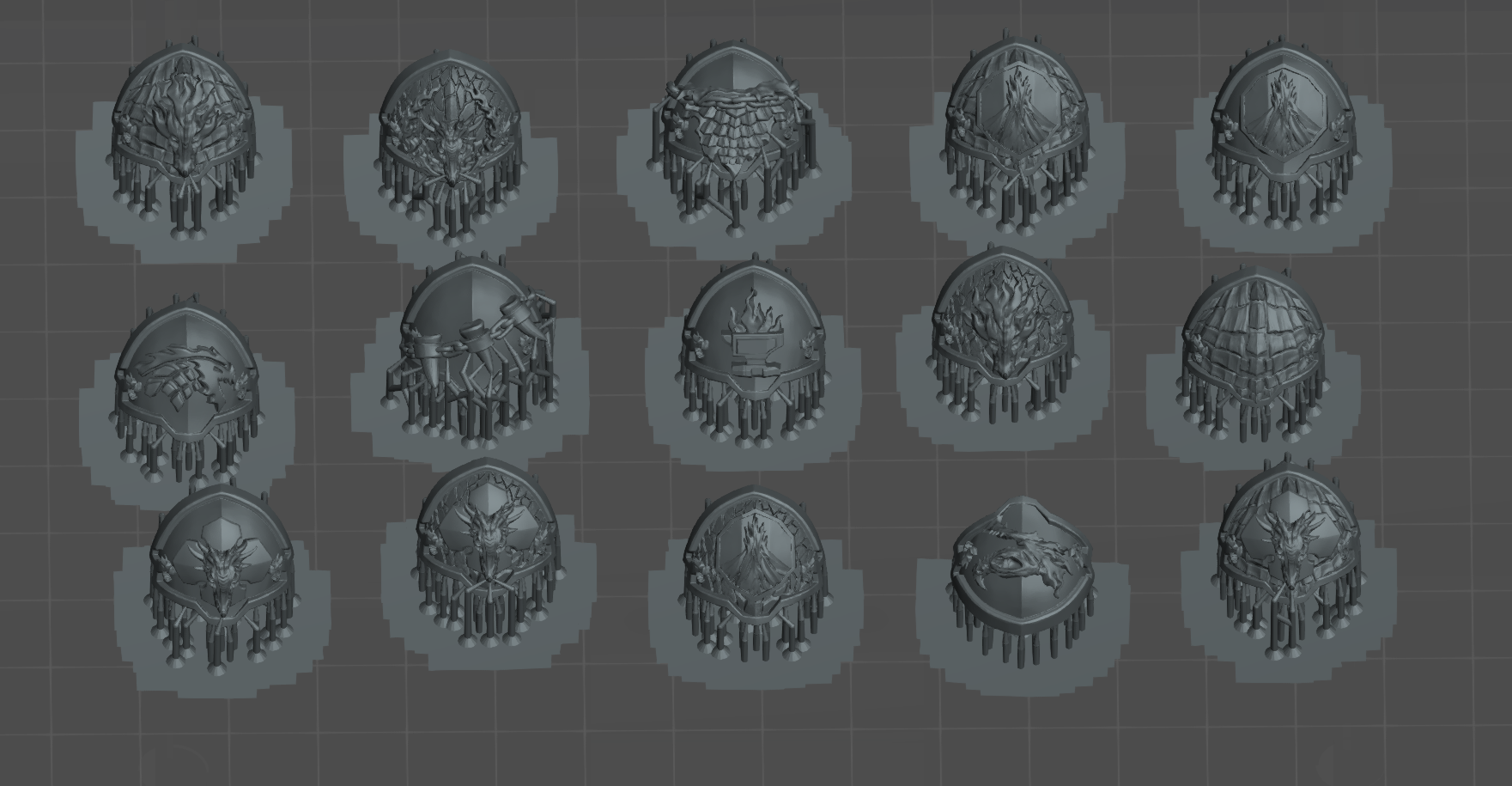 a collection of various 3D models or designs, including shields, helmets, and other metallic or metallic-looking objects. The objects appear to be in a digital format, possibly as a 3D rendering or a 3D model. The image does not contain any text or specific details about the objects, and it does not include any descriptions or explanations about the objects.