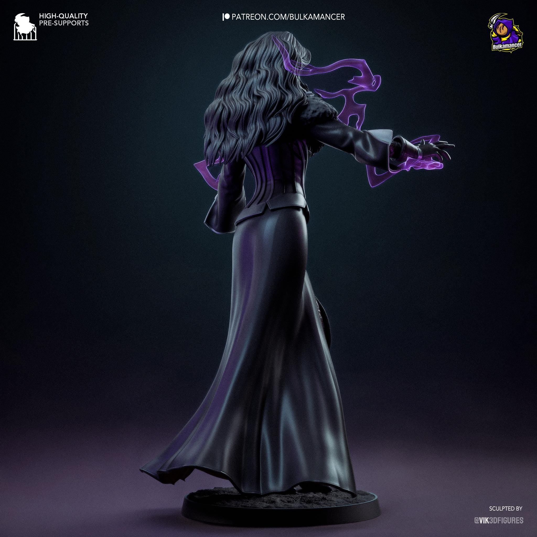 a figurine of a woman dressed in black and purple