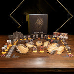 a board game called "Malicious Order" with various game components and accessories arranged on a wooden table.